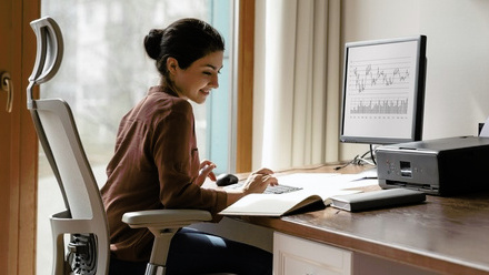 woman at desk cropped.jpg