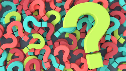 A graphic of lots of different question marks of different colours - lime green, turquoise and red - with one larger question mark on the right side