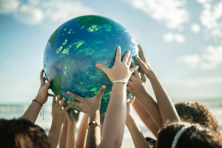 istock-image-of-hands-holding-globe