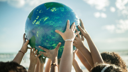 istock-image-of-hands-holding-globe