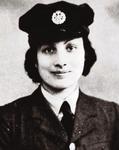 Black and white photo of a woman in army uniform and hat 