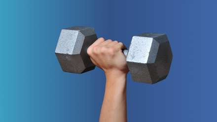 Arm extended lifting weights in the air