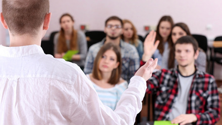 bigstock-Group-of-students-sitting-in-c-82677032a.jpg