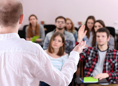 bigstock-Group-of-students-sitting-in-c-82677032a.jpg