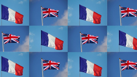 A grid of 12 photographs showing French and British flags flying against blue skies with white clouds